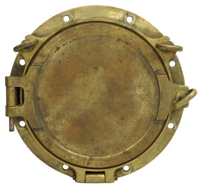 Appraisal: Nautical brass porthole th c ship's porthole opening to framed