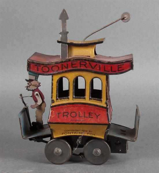 Appraisal: Nifty ''Toonerville Trolley'' lithographed tin toy circa marked on side