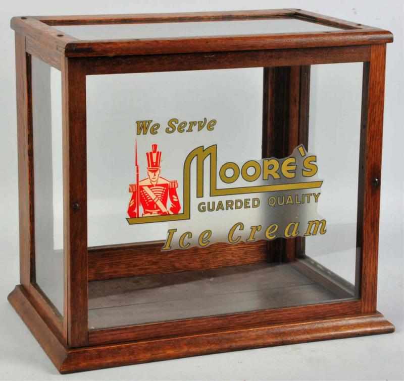 Appraisal: Oak Showcase Displays a Moore's Ice Cream decal on front