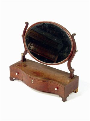 Appraisal: An early th century mahogany dressing table mirror with an