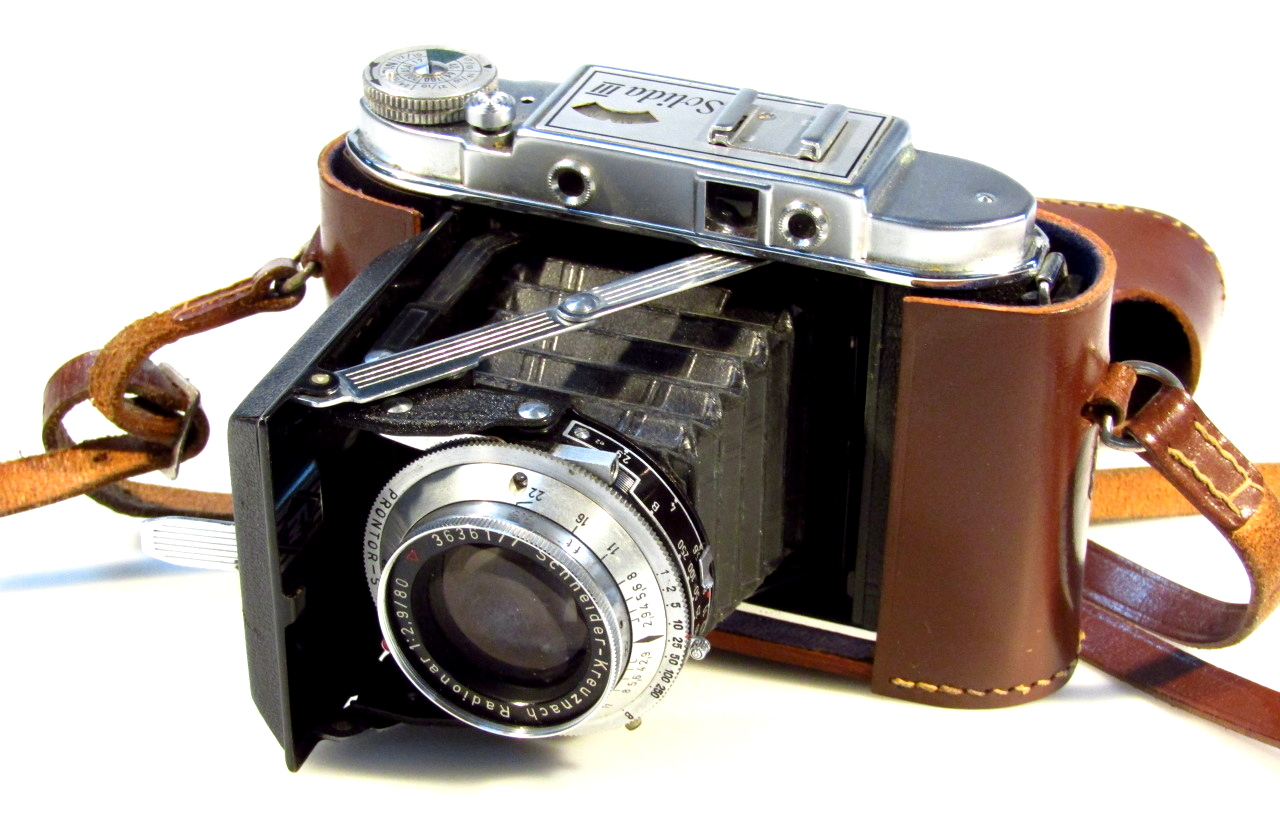 Appraisal: A Solida III camera the articulated front revealing a Schneider-Kreuznach