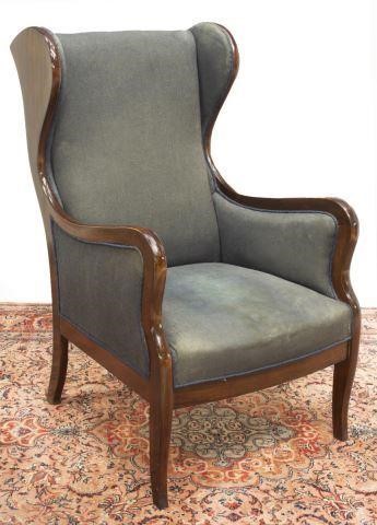 Appraisal: Danish mahogany framed wingback chair mid th c having dark