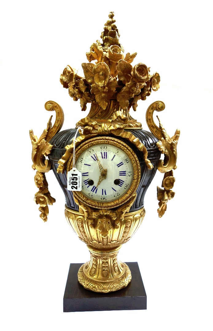 Appraisal: A Continental gilt and patinated bronze mantel clock th century