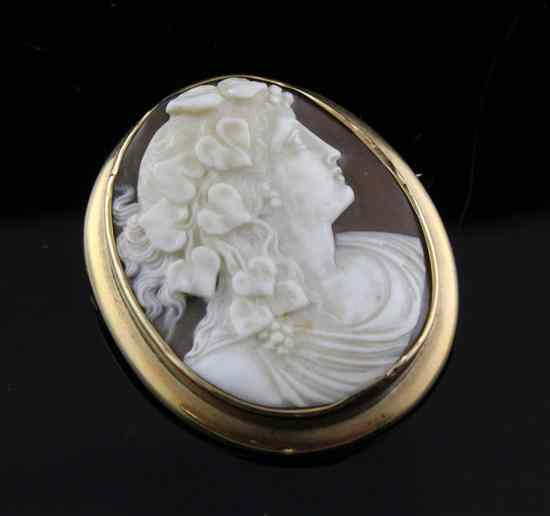 Appraisal: A Victorian gold mounted oval cameo brooch carved with the