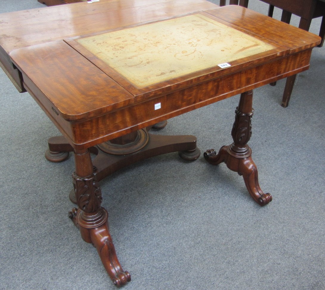 Appraisal: A Victorian mahogany reading table with angle adjustment top over