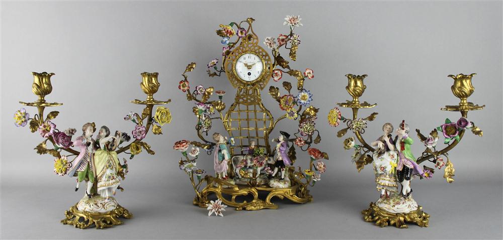 Appraisal: LOUIS XV STYLE GILT BRONZE AND PORCELAIN CLOCK GARNITURE two