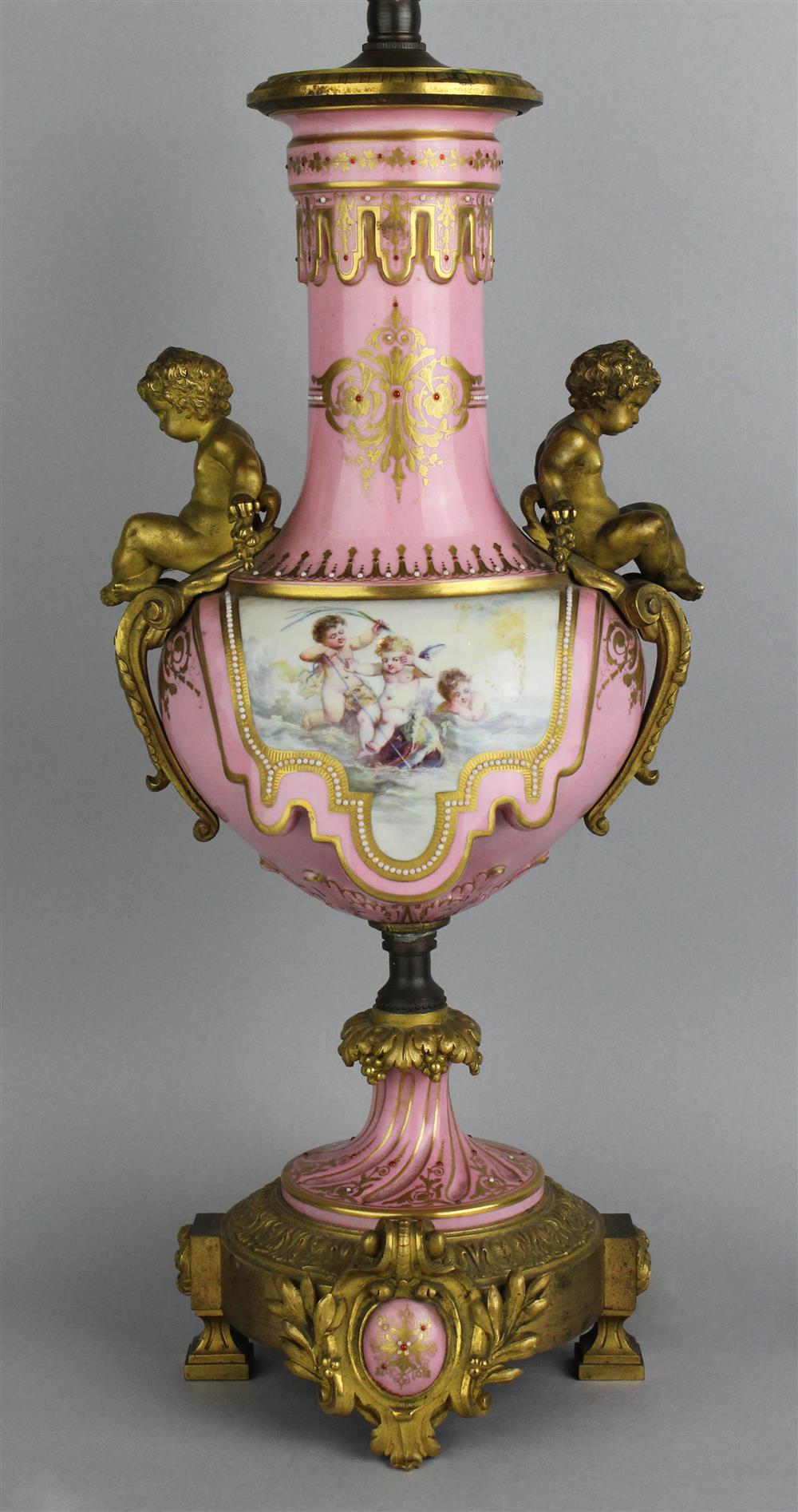 Appraisal: SEVRES STYLE PINK GROUND TABLE LAMP of bottle shape the