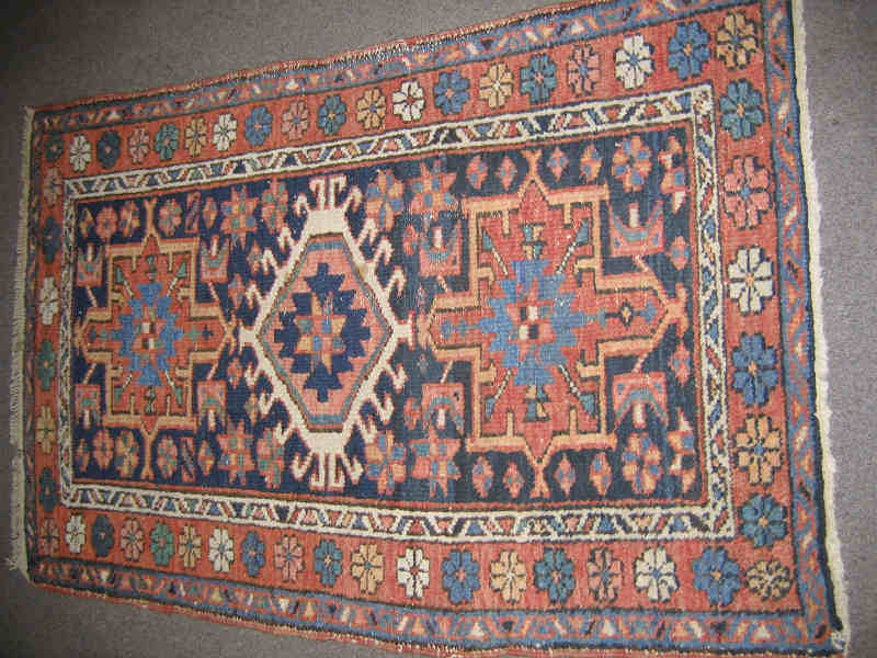 Appraisal: KARAJA THROW RUG The indigo field of geometric design centers