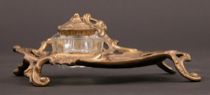 Appraisal: Rococo Standish Rococo standish has a scroll-footed base accented by