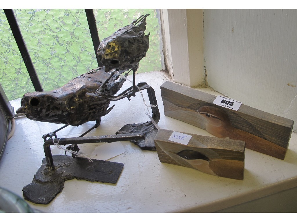 Appraisal: Two metal bird sculptures and two wooden sculptures