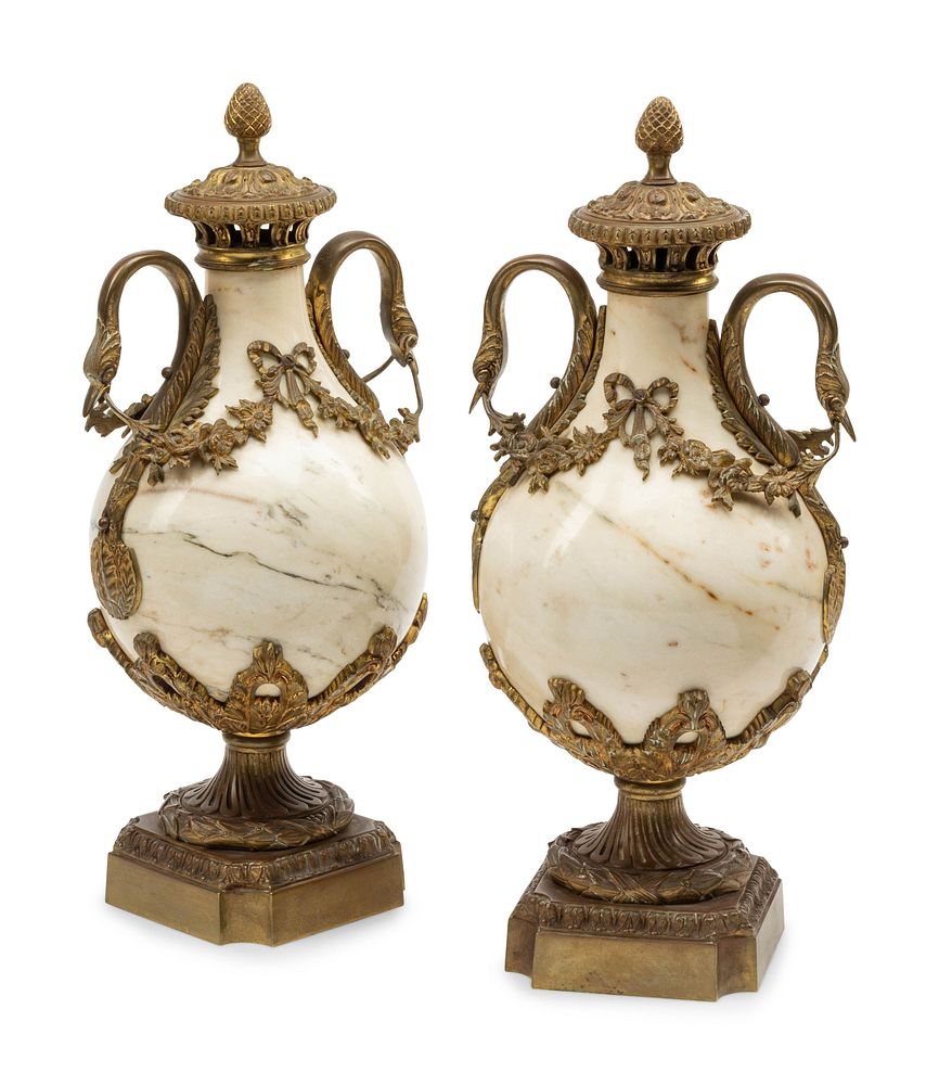 Appraisal: A Pair of Continental Gilt Bronze Mounted Marble Urns A