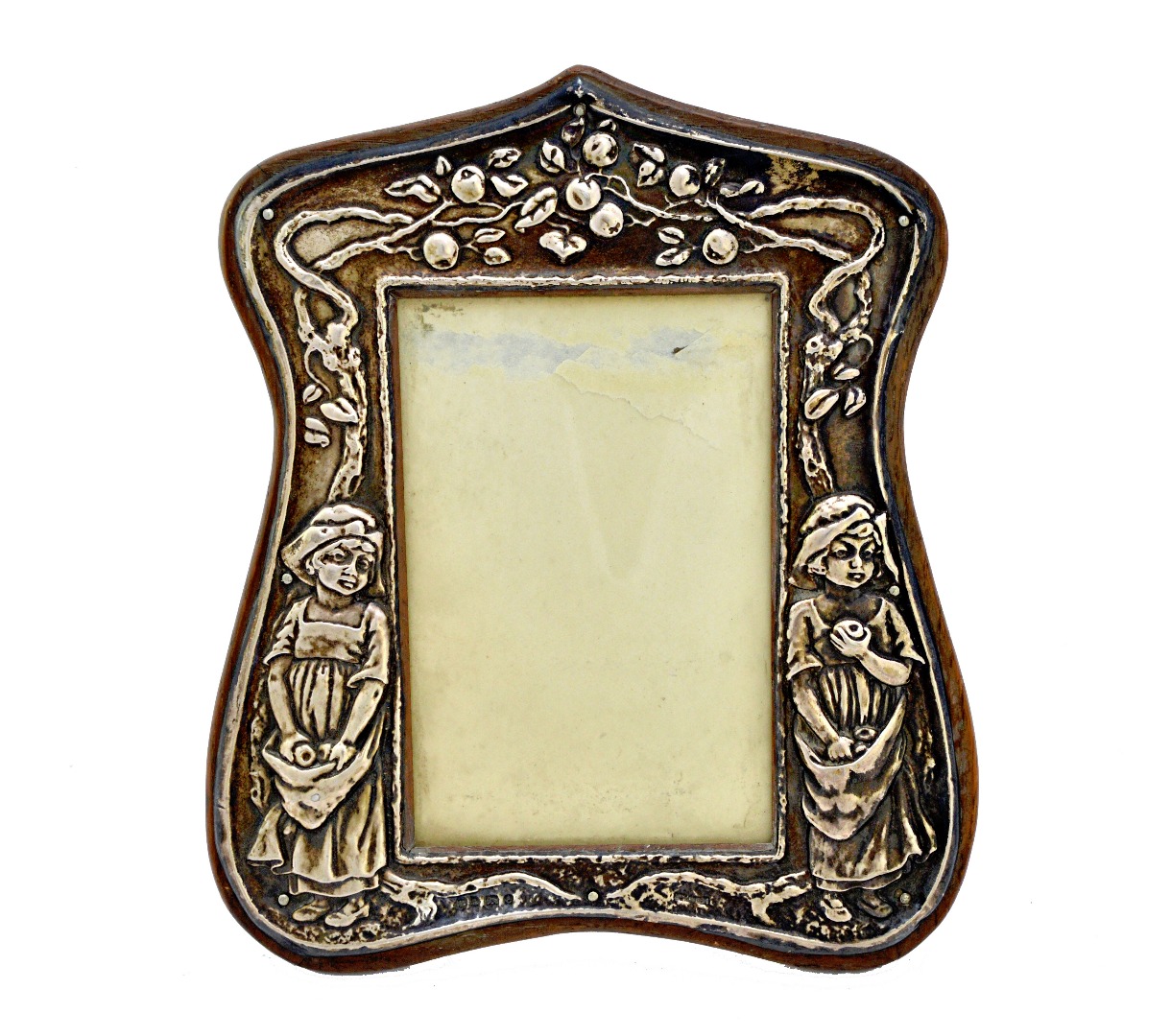 Appraisal: A silver mounted oak shaped rectangular photograph frame decorated with