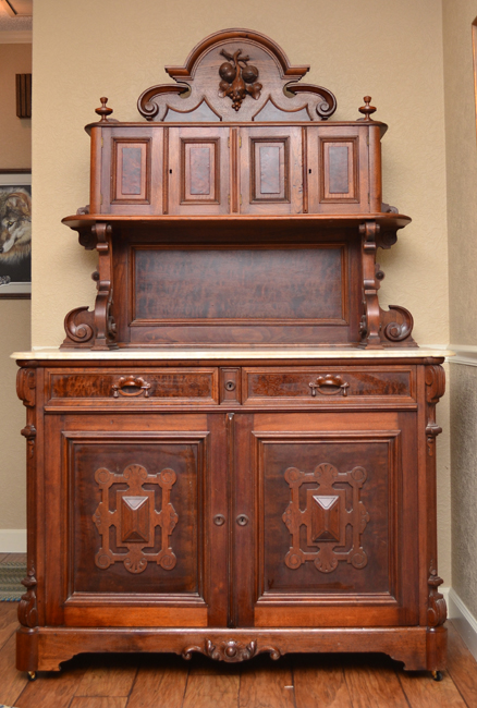 Appraisal: VICTORIAN CARVED MARBLE TOP SIDEBOARD Carved crest with applied decoration