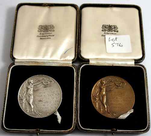 Appraisal: Stoke on Trent Education Medals One Silver one Brass cased