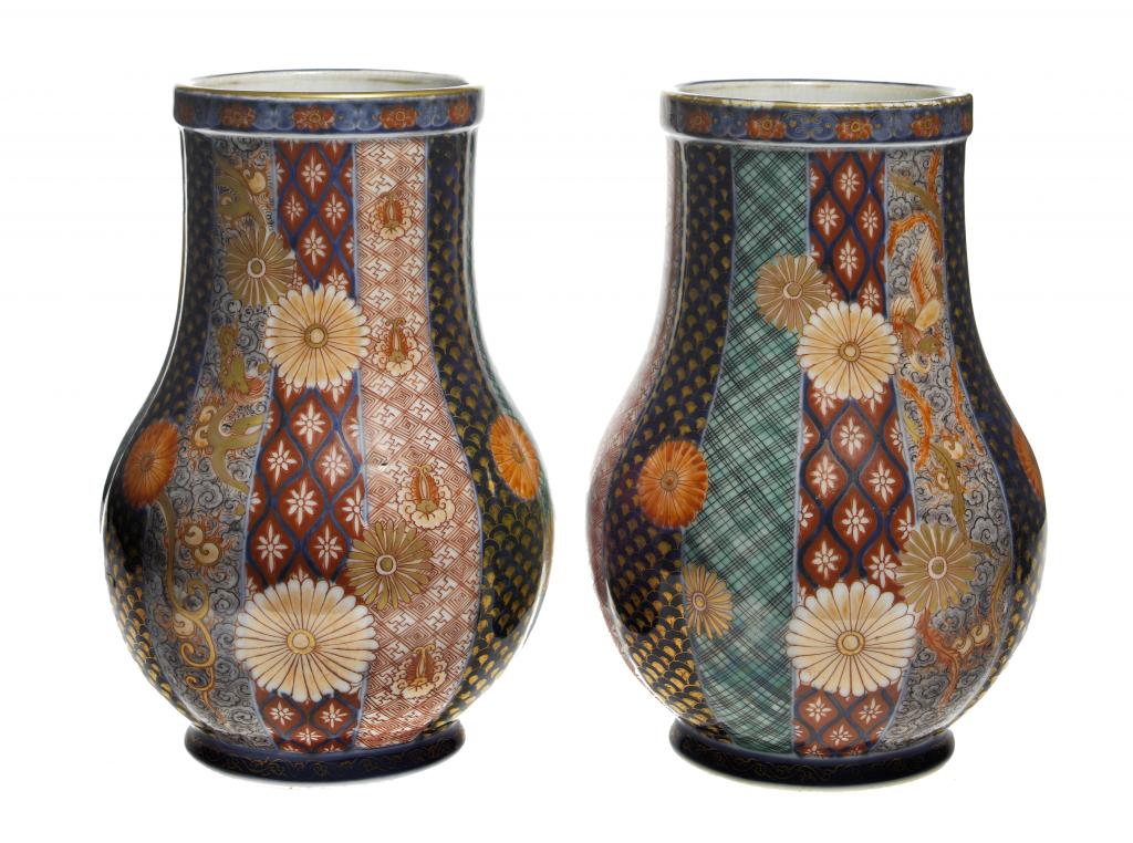 Appraisal: A PAIR OF IMARI VASES of baluster shape richly decorated