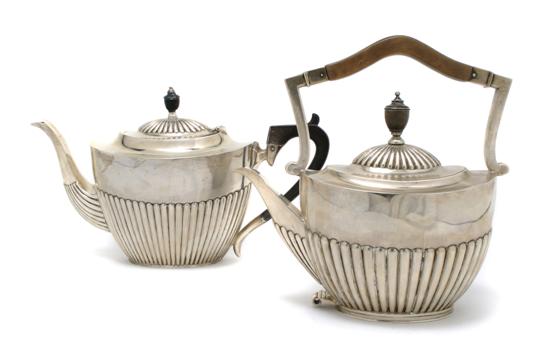 Appraisal: A Group of Two English Silver Teapots Width of largest