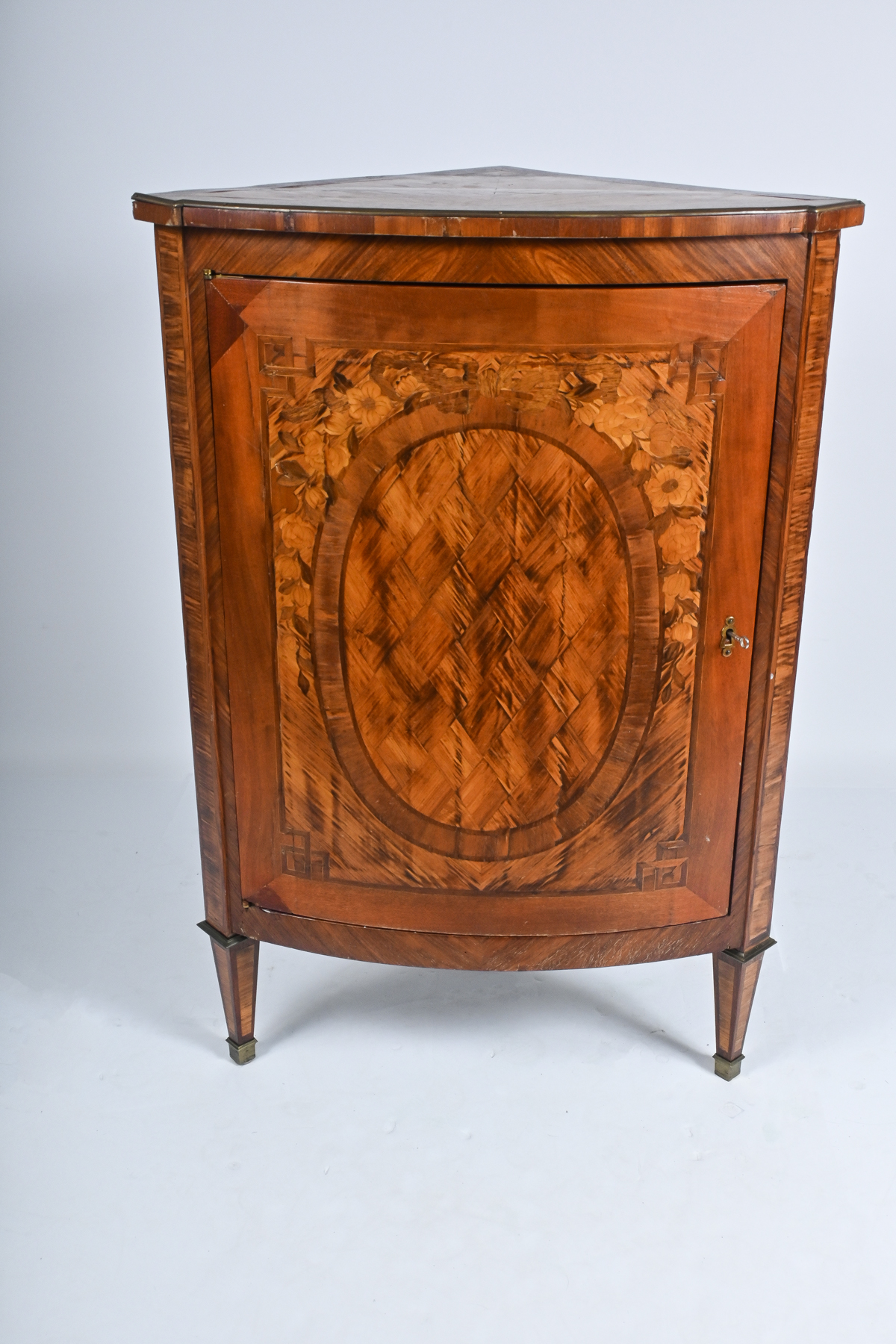 Appraisal: MARQUETRY INLAID CORNER CABINET Single door Marquetry inlaid Corner cabinet