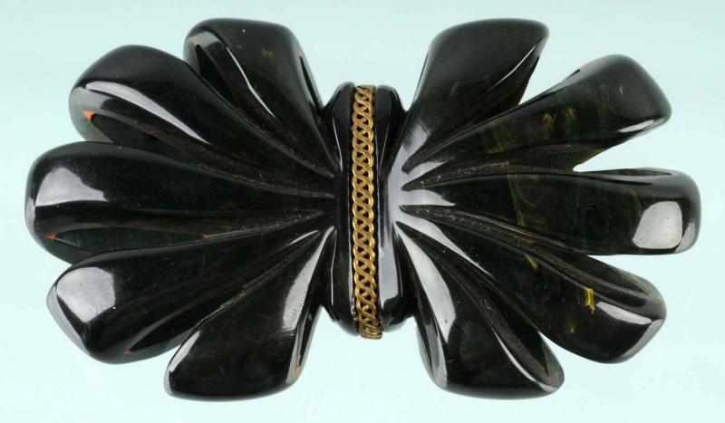 Appraisal: Bakelite Black Floral Pin Description CORRECTION Pin is moon stone