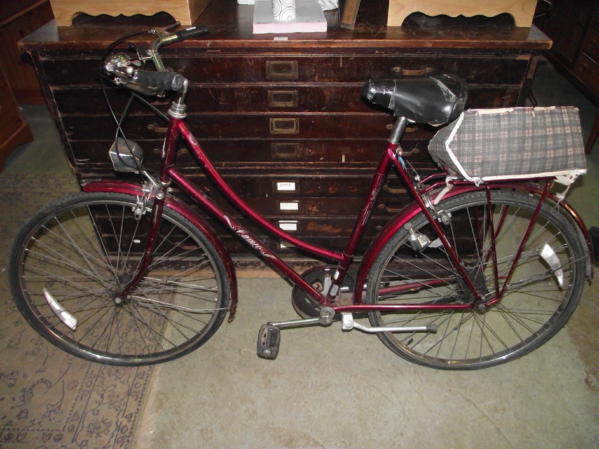 Appraisal: A Raleigh Cameo ladies bicycle with burgundy painted livery