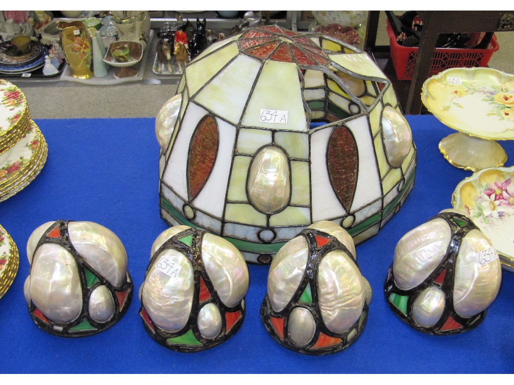 Appraisal: Lot comprising four leaded glass and shell lightshades and one