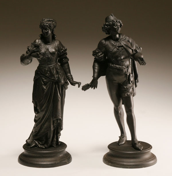 Appraisal: Pair European spelter sculptures of male and female figures in