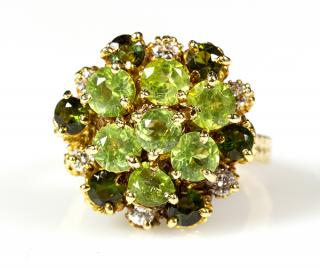 Appraisal: Peridot green tourmaline diamond and k yellow gold ring Peridot