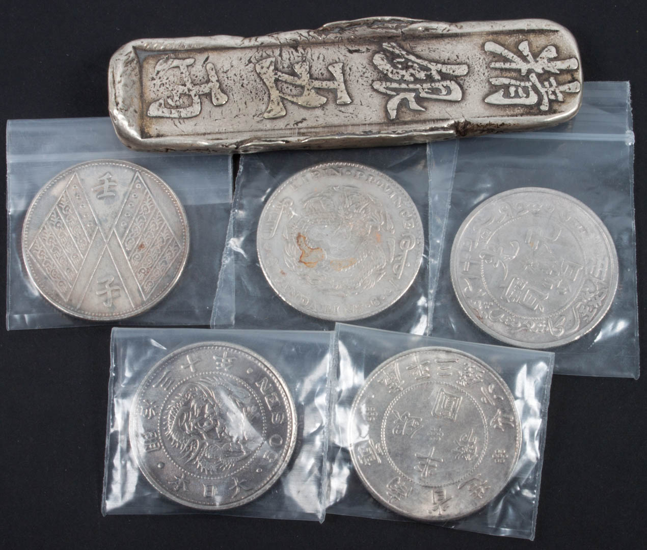 Appraisal: Chinese sycee silver ingot th century of about taels' value