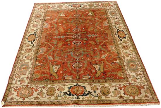 Appraisal: RUG Serapi carpet burnt orange ground with cream border accents