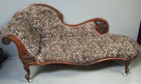 Appraisal: Victorian mahogany framed serpentine chaise longue with arched and scrolling