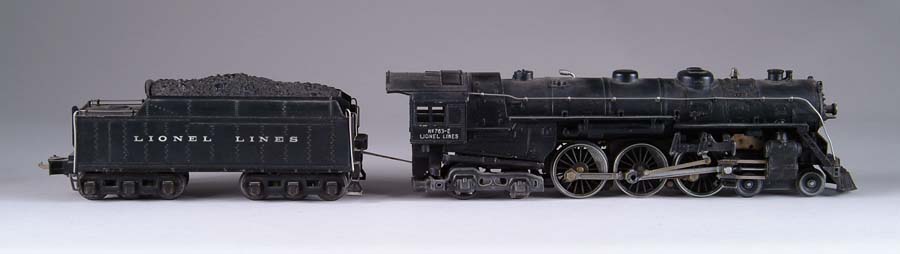 Appraisal: LIONEL E IN BLACK WITH MATCHING TENDER WX Locomotive and