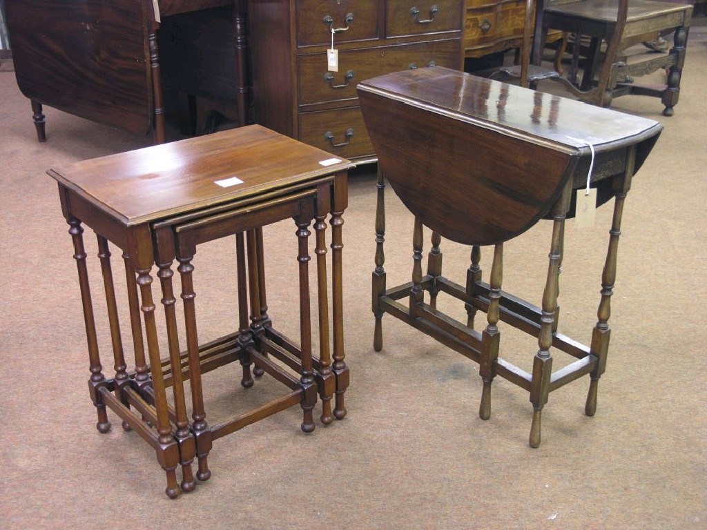 Appraisal: A mahogany 'spider-leg' gateleg table on turned underframe ft and