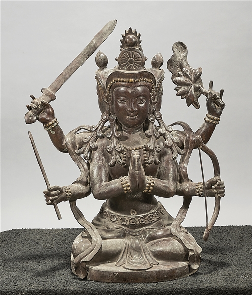 Appraisal: Chinese bronze figure of Guanyin Seated in 'dhyanasana' on a