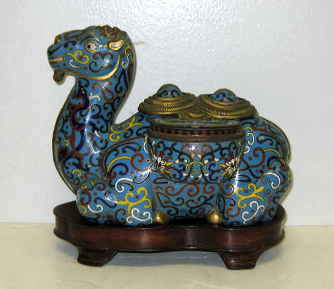 Appraisal: CHINESE CLOISONNE ENAMEL BACTRIAN CAMEL Two-hump seated stylized scroll and