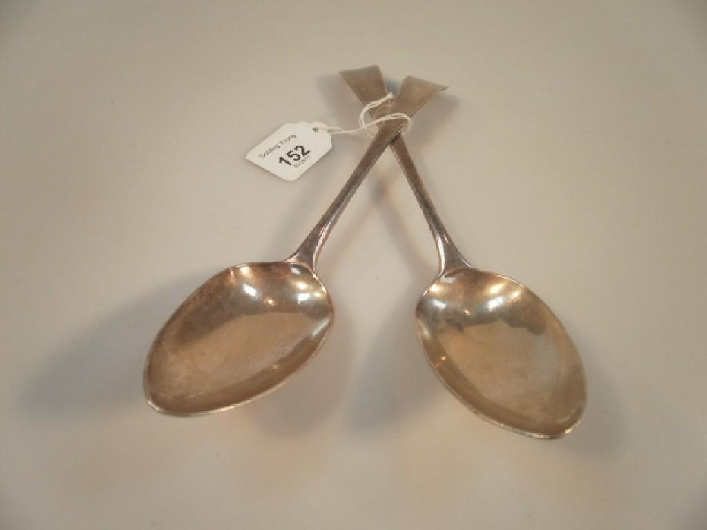 Appraisal: A pair of silver Old English pattern spoons London oz