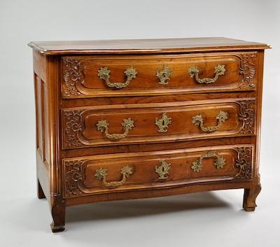 Appraisal: A French Regence Three-Drawer Commode ca With carved drawer fronts