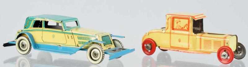 Appraisal: Lot of Tin Litho Automobile Penny Toys German Both marked