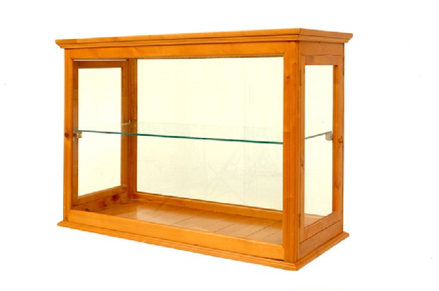 Appraisal: A CONTEMPORARY HUON PINE DISPLAY CABINET Rectangular with glazed panels