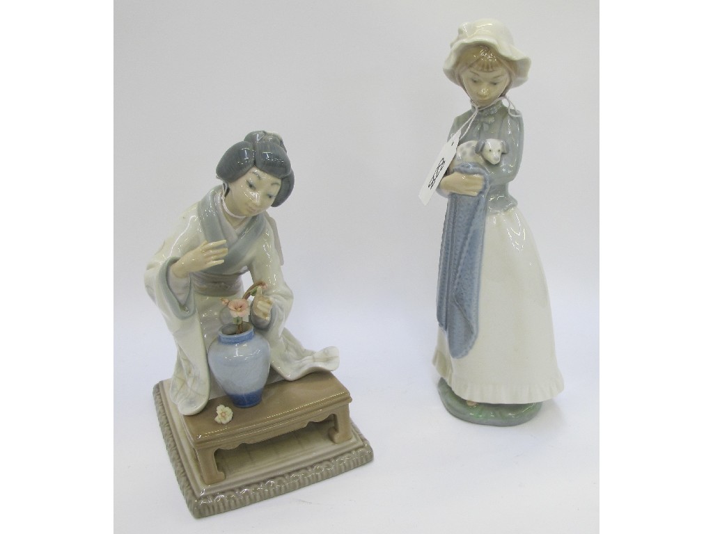 Appraisal: Lladro figure of a geisha and a Nao figure of