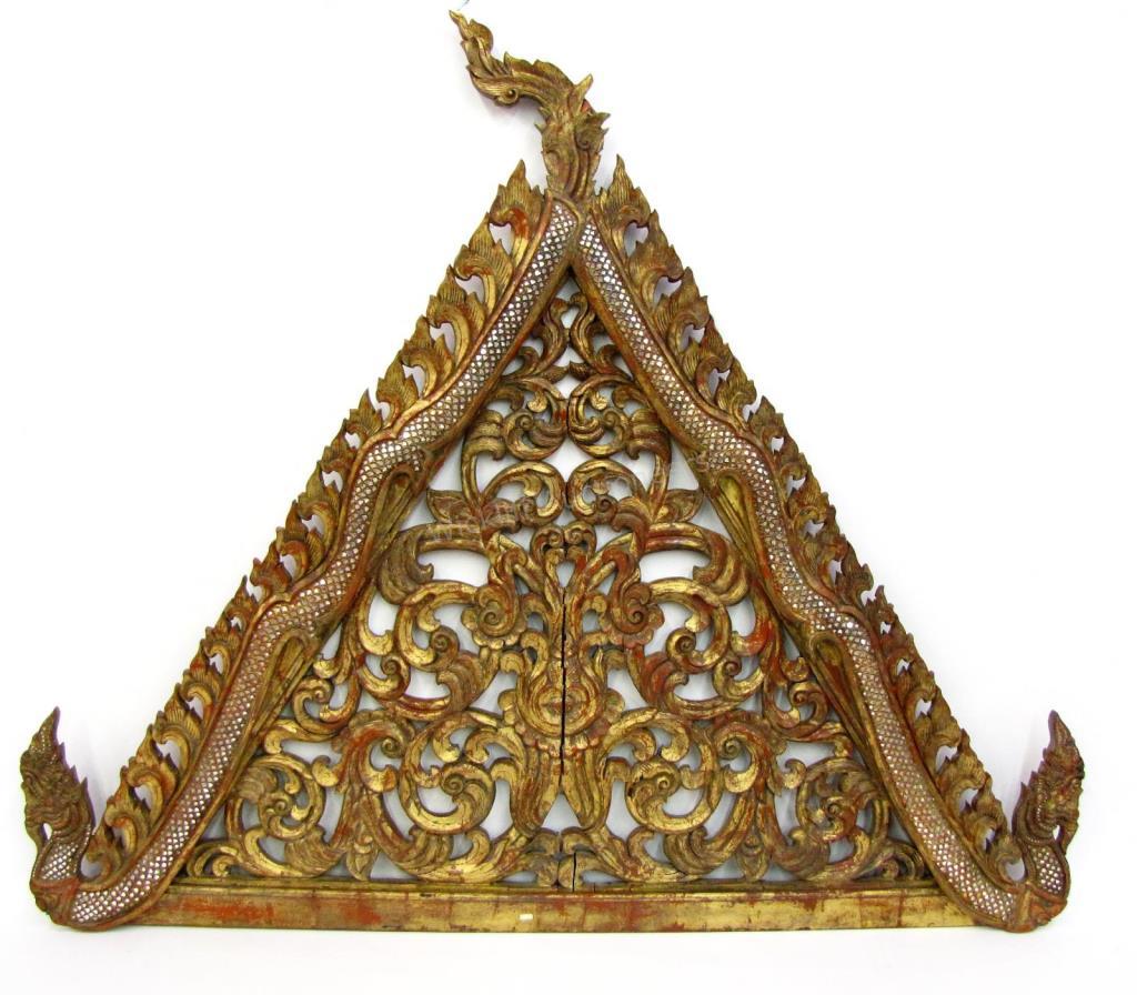 Appraisal: A painted Balinese triangular architectural element dragon motif with clear