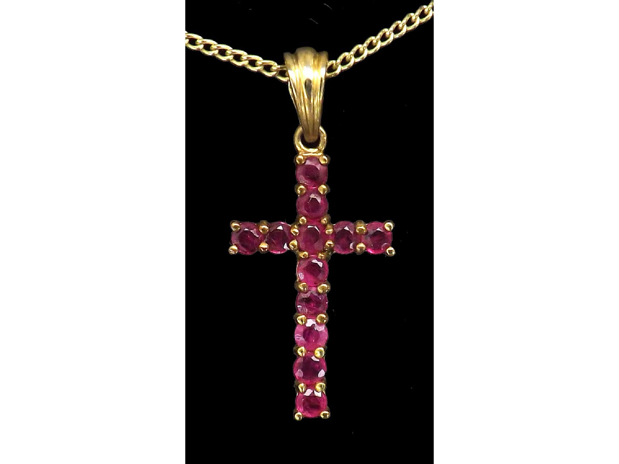 Appraisal: ct ruby cross pendant on a slender necklet pendant mm