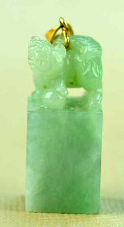 Appraisal: Chinese Jadeite K Gold Mounted PendantA fine jadeite pendant in