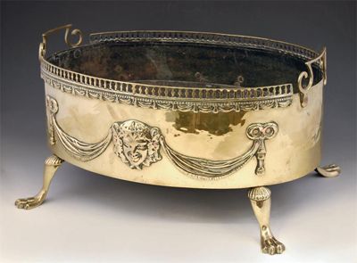 Appraisal: An early th century brass jardiniere with a pierced gallery