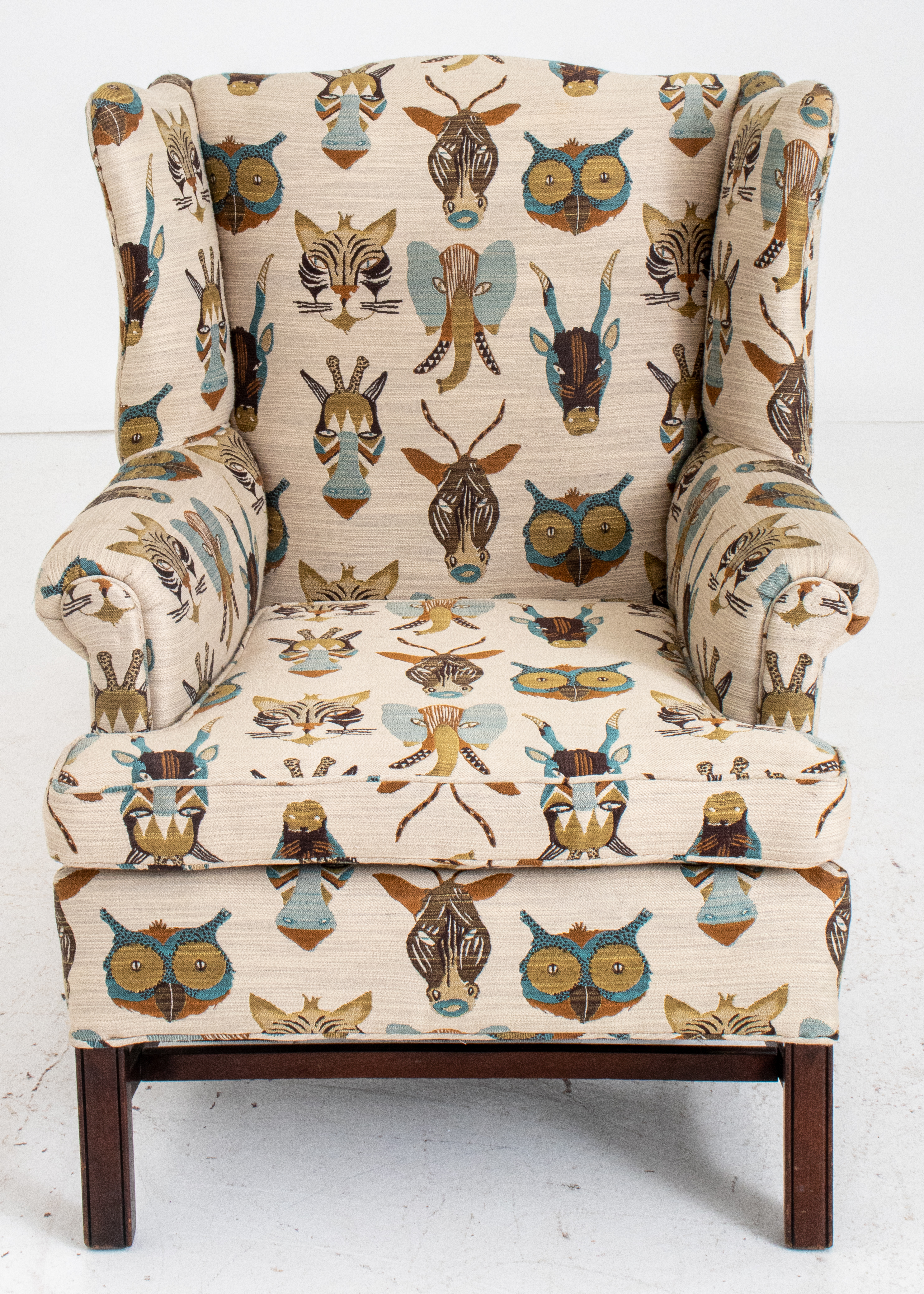 Appraisal: CLASSICAL 'ANIMAL TROPHY' WINGBACK ARMCHAIR Classical wingback armchair with animal