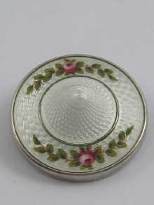 Appraisal: A white metal tests silver brooch enamelled with roses on