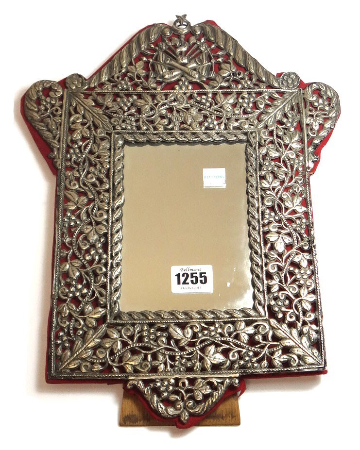 Appraisal: An Ottoman silver mounted openwork mirror frame pierced with foliate