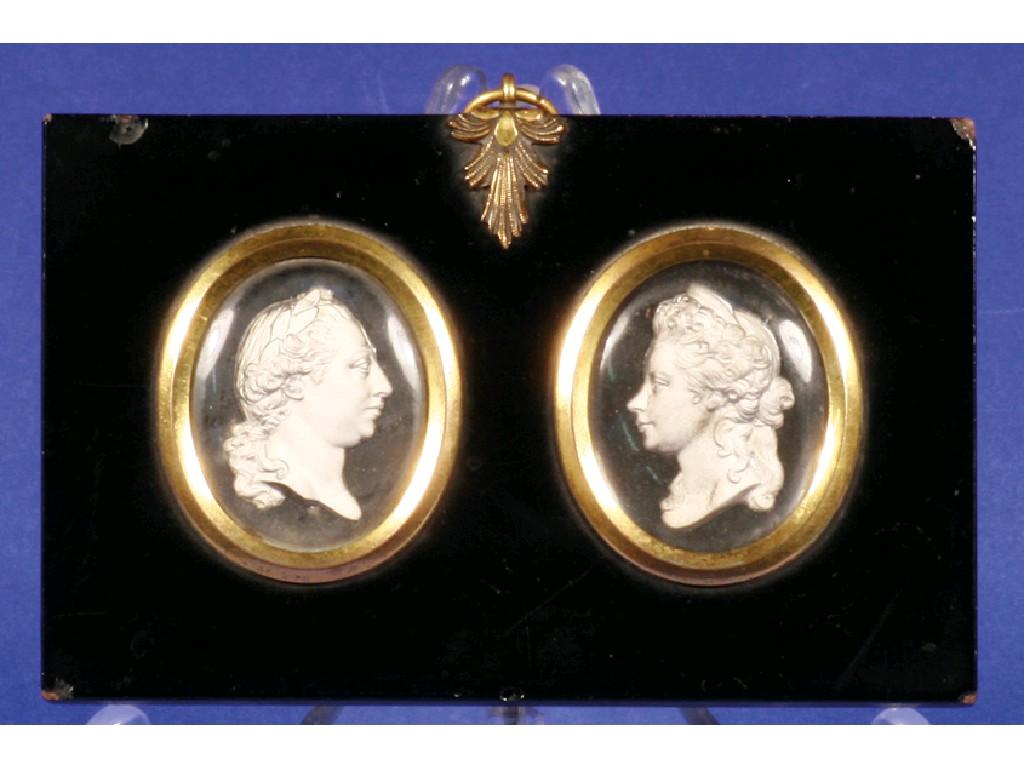 Appraisal: A PAIR OF TH CENTURY INTAGLIO-CUT GLASS PORTRAITS possibly George