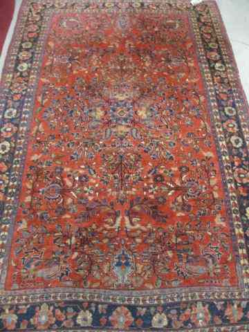 Appraisal: Sarouk Persian Handmade Rug antique elaborate florals reds blues ivory