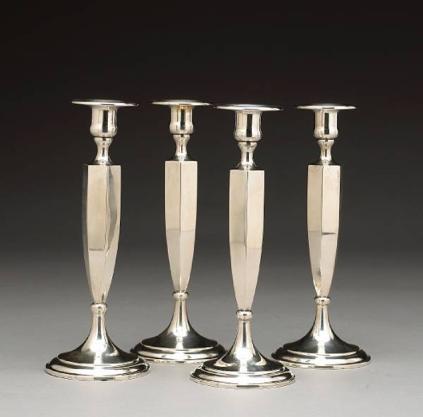 Appraisal: A set of four sterling candlesticksShreve amp Co San Francisco