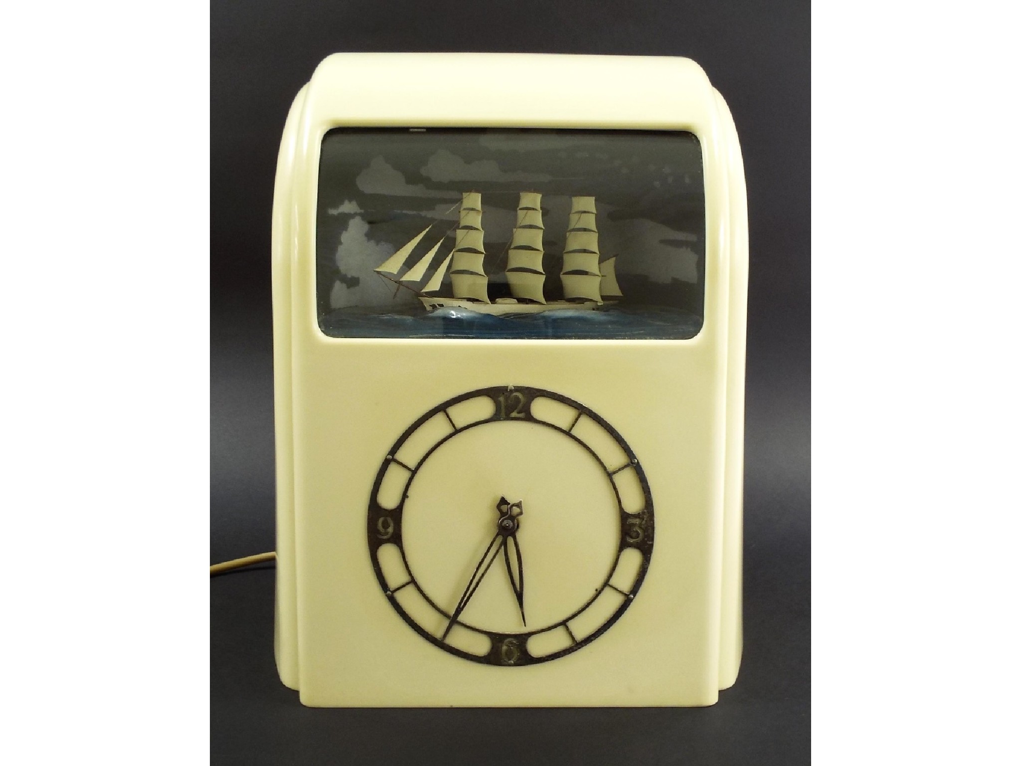 Appraisal: Vintage Vitascope Bakelite cased automaton clock fitted with a three