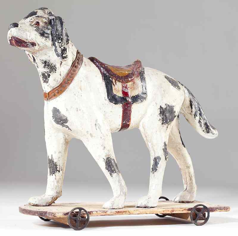 Appraisal: Carved Wood Canine Pull Toy circa a large spotted dog